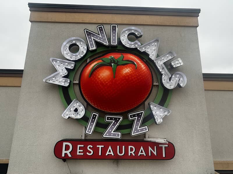 An image of the outdoor signage for Monical's Pizza.